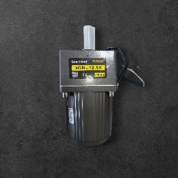 indukcijski motor, reduktor, 15W motor, 112RPM, ceneje, ugodno, prihranek, lokalno, Ljubljana, pakirni stroji, zanesljiv motor, dolgoročna uporaba