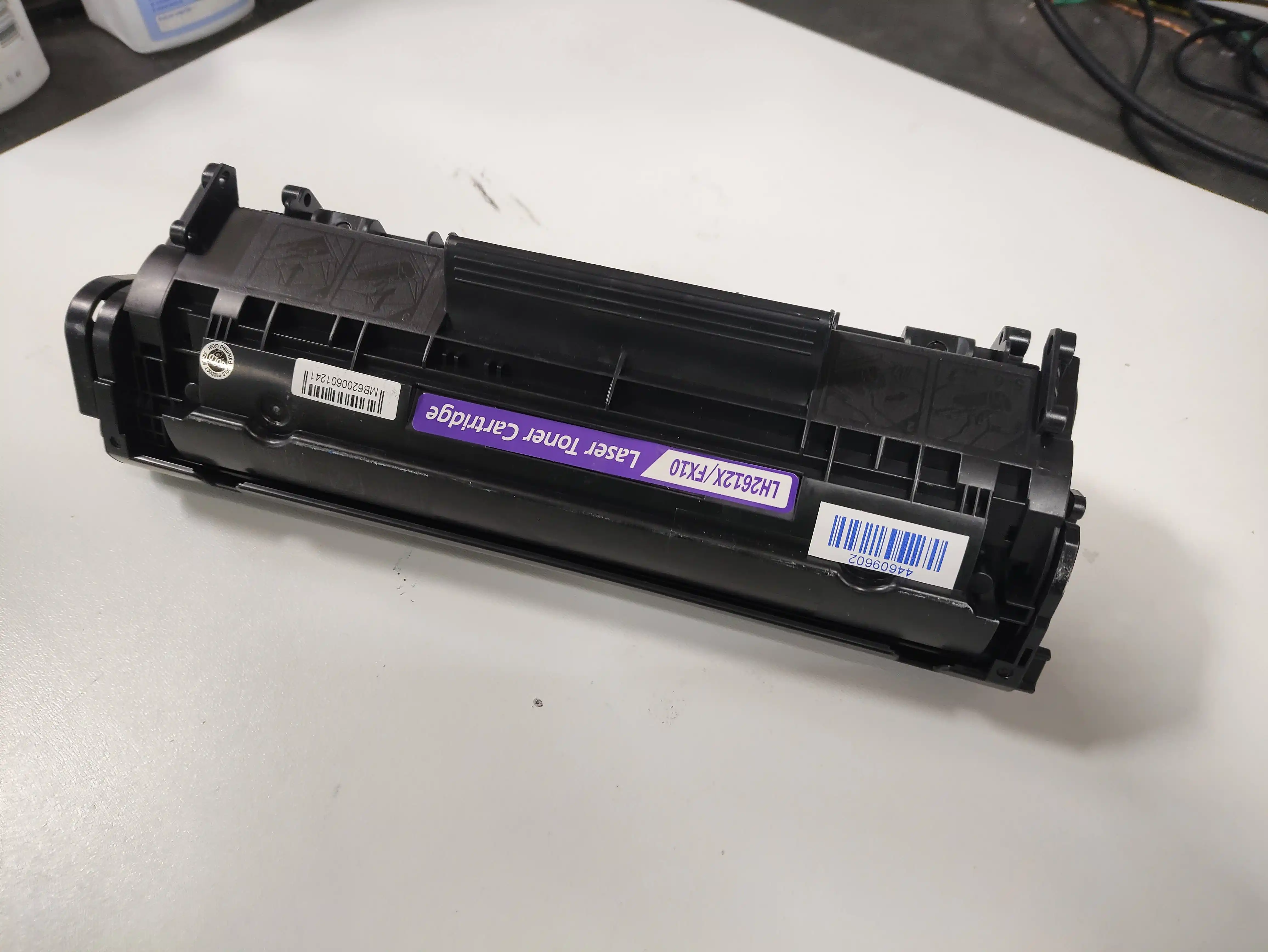 Storitev Polnjenja Tonerja Q2612a za HP LaserJet in Canon CRG-103: Kako Izboljšati Vaš Tiskalniški Izpis, polnjenje tonerja, toner Q2612a, HP LaserJet, Canon CRG-103, obnova tonerja, kakovostni izpisi, ekonomska obnova, mikrovibracije, ekološka obnova, hitra obnova tonerja, zanesljiva obnova, specializirana storitev