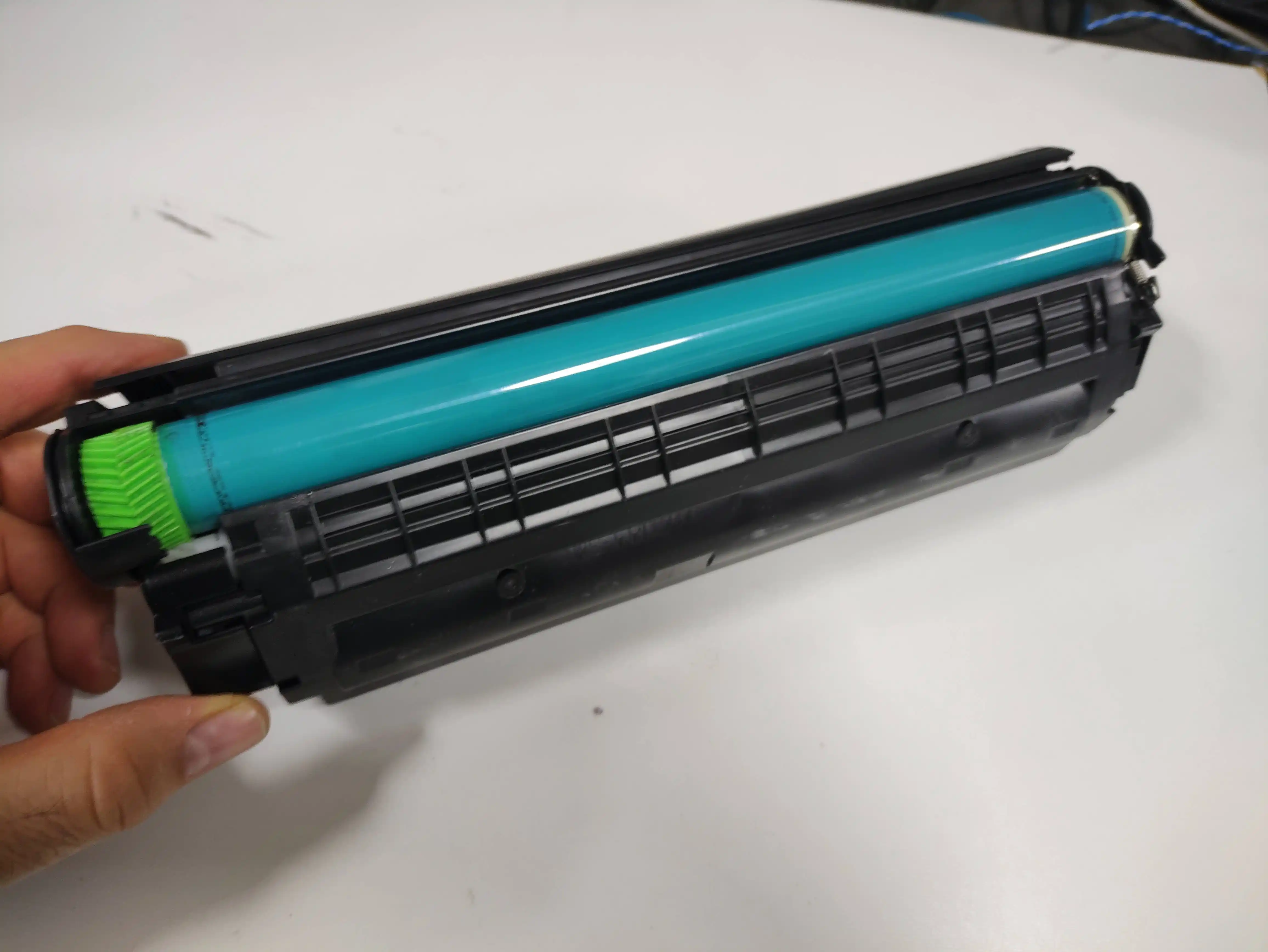 Storitev Polnjenja Tonerja Q2612a za HP LaserJet in Canon CRG-103: Kako Izboljšati Vaš Tiskalniški Izpis, polnjenje tonerja, toner Q2612a, HP LaserJet, Canon CRG-103, obnova tonerja, kakovostni izpisi, ekonomska obnova, mikrovibracije, ekološka obnova, hitra obnova tonerja, zanesljiva obnova, specializirana storitev
